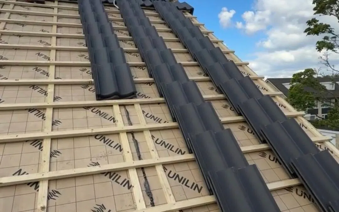 Dakpannen vervangen inclusief onderdak en isolatie: kosten.